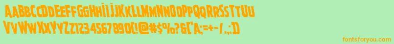 Ghoulishintentleft-Schriftart – Orangefarbene Schriften auf grünem Hintergrund