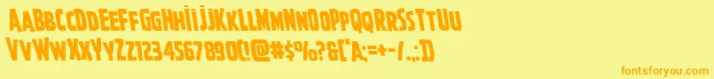 フォントGhoulishintentleft – オレンジの文字が黄色の背景にあります。