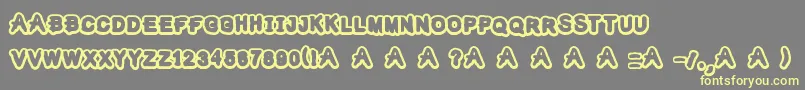 TheKidsMraker Font – Yellow Fonts on Gray Background