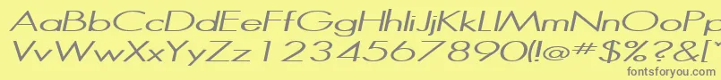 HalibutItalic-fontti – harmaat kirjasimet keltaisella taustalla