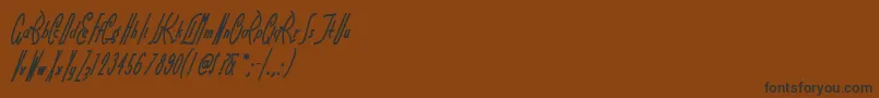 Czcionka Littrn – czarne czcionki na brązowym tle