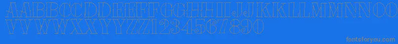 フォントTat – 青い背景に灰色の文字