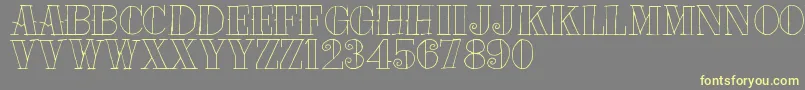 Tat Font – Yellow Fonts on Gray Background