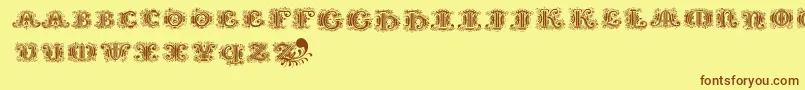 Silvestreinitials Font – Brown Fonts on Yellow Background