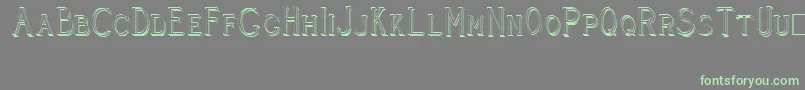 CleaversJuveniaRaised Font – Green Fonts on Gray Background