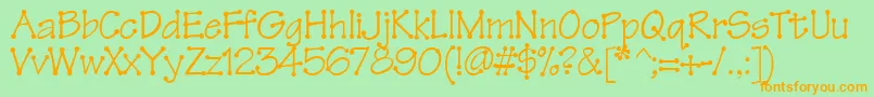 フォントTinkertoy – オレンジの文字が緑の背景にあります。