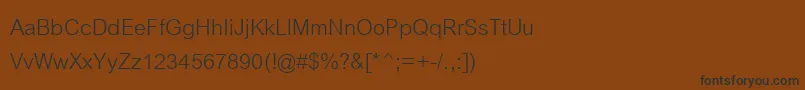 Cordiaupc Font – Black Fonts on Brown Background