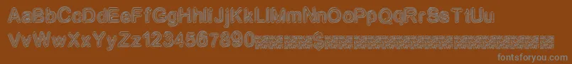 Neondisco Font – Gray Fonts on Brown Background
