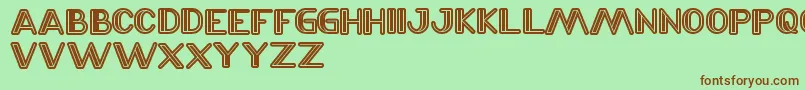 LaserGun-fontti – ruskeat fontit vihreällä taustalla