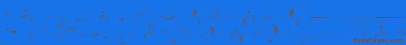 Ornamind Font – Brown Fonts on Blue Background