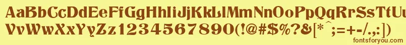 フォントTitania – 茶色の文字が黄色の背景にあります。