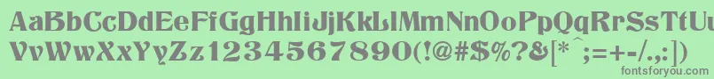 Titania-fontti – harmaat kirjasimet vihreällä taustalla