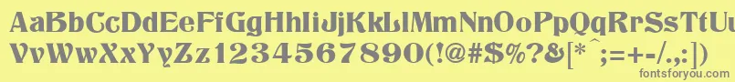 Titania-fontti – harmaat kirjasimet keltaisella taustalla