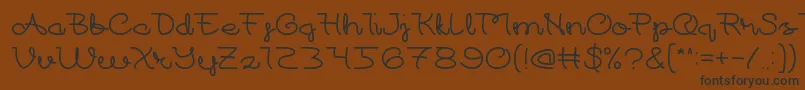 At Font – Black Fonts on Brown Background