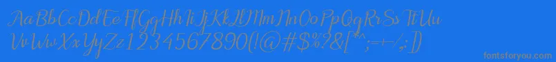 フォントMotiraItalic – 青い背景に灰色の文字
