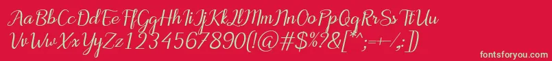 Czcionka MotiraItalic – zielone czcionki na czerwonym tle