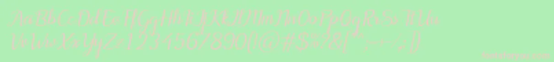MotiraItalic-fontti – vaaleanpunaiset fontit vihreällä taustalla