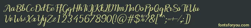 フォントMotiraItalic – 黒い背景に黄色の文字