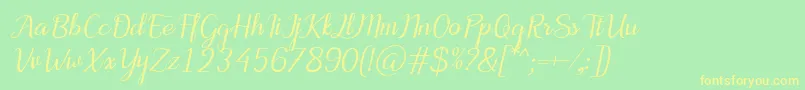 MotiraItalic-fontti – keltaiset fontit vihreällä taustalla