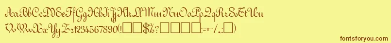 フォントGessele – 茶色の文字が黄色の背景にあります。