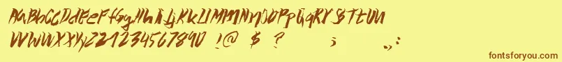 Wolvos Font – Brown Fonts on Yellow Background
