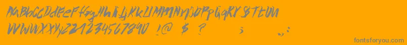 Fonte Wolvos – fontes cinzas em um fundo laranja