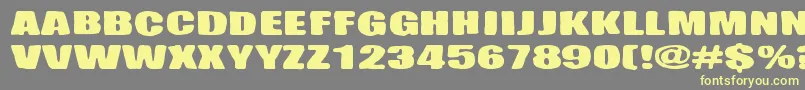 Hiekkalasi-Schriftart – Gelbe Schriften auf grauem Hintergrund