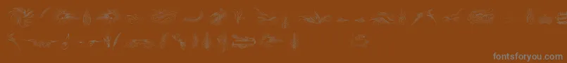 Шрифт PenmanshipBirdsAndOrnamentsFree – серые шрифты на коричневом фоне