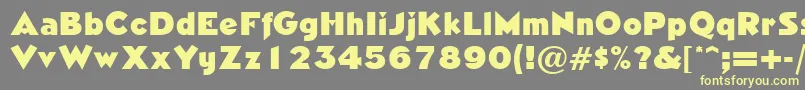 フォントNeasdenRegularDb – 黄色のフォント、灰色の背景