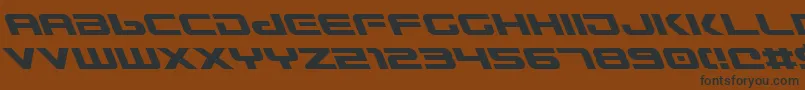 フォントGunshipLeftalic – 黒い文字が茶色の背景にあります