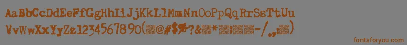 フォントSuperkeys – 茶色の文字が灰色の背景にあります。