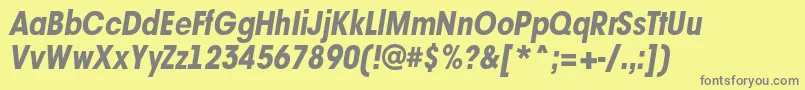 AAvantetcknrExtrabolditalic-fontti – harmaat kirjasimet keltaisella taustalla