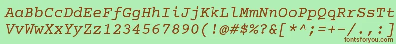 Czcionka Courierprime Italic – brązowe czcionki na zielonym tle