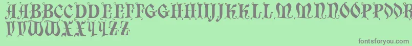 Chaillot-Schriftart – Graue Schriften auf grünem Hintergrund
