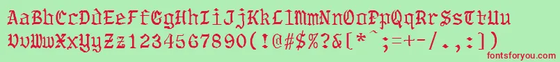 TorsholmaRegular Font – Red Fonts on Green Background
