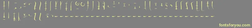 LswDrachenklaueSamys0.1 Font – Yellow Fonts on Gray Background