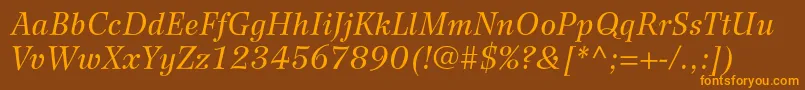 WilkeltstdItalic Font – Orange Fonts on Brown Background