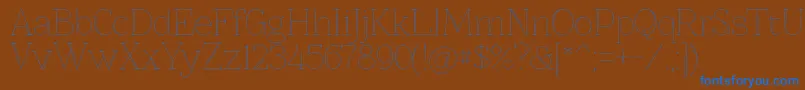 Znikomitno25 Font – Blue Fonts on Brown Background