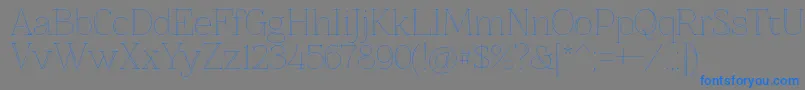 Znikomitno25 Font – Blue Fonts on Gray Background