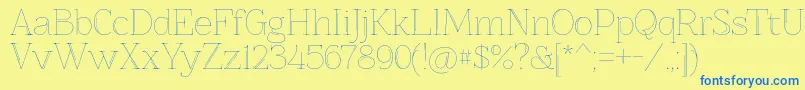 Znikomitno25 Font – Blue Fonts on Yellow Background