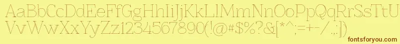 Znikomitno25 Font – Brown Fonts on Yellow Background
