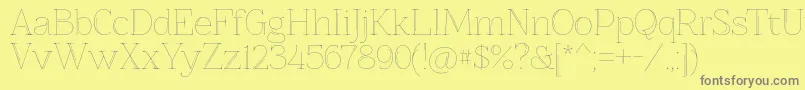 Znikomitno25 Font – Gray Fonts on Yellow Background