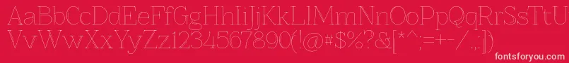 Znikomitno25-Schriftart – Rosa Schriften auf rotem Hintergrund