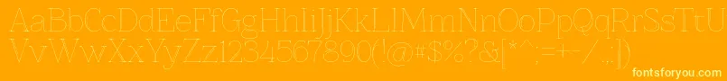 Znikomitno25 Font – Yellow Fonts on Orange Background