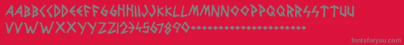 フォントWolvesAndRuin – 赤い背景に灰色の文字