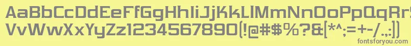 VibrocentricBd-Schriftart – Graue Schriften auf gelbem Hintergrund