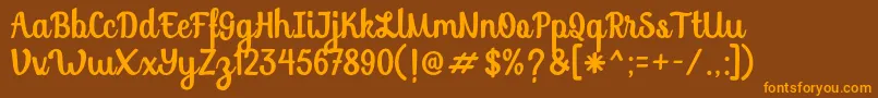 Fonte SoybeanutFree – fontes laranjas em um fundo marrom