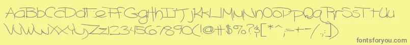 フォントBlazingheat9RegularTtext – 黄色の背景に灰色の文字