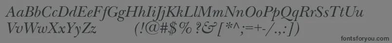 NewbaskervilleexpodcItalic-Schriftart – Schwarze Schriften auf grauem Hintergrund