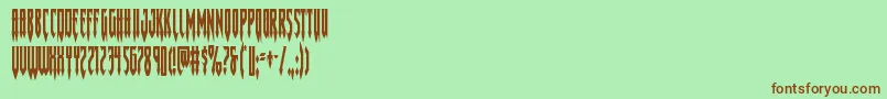 フォントGotharcticacond – 緑の背景に茶色のフォント